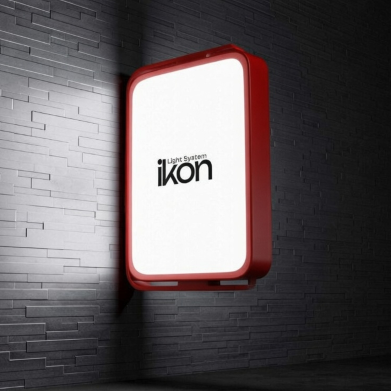 Caja de luz IKON Caja de luz con rótulo IKON color rojo en fondo gris